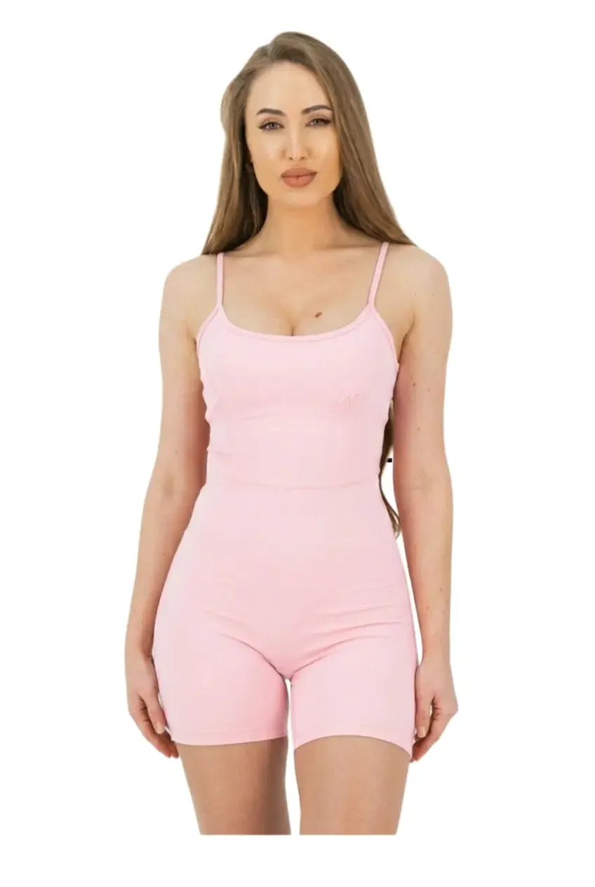 Woman wearing a pink bodysuit on a white background
